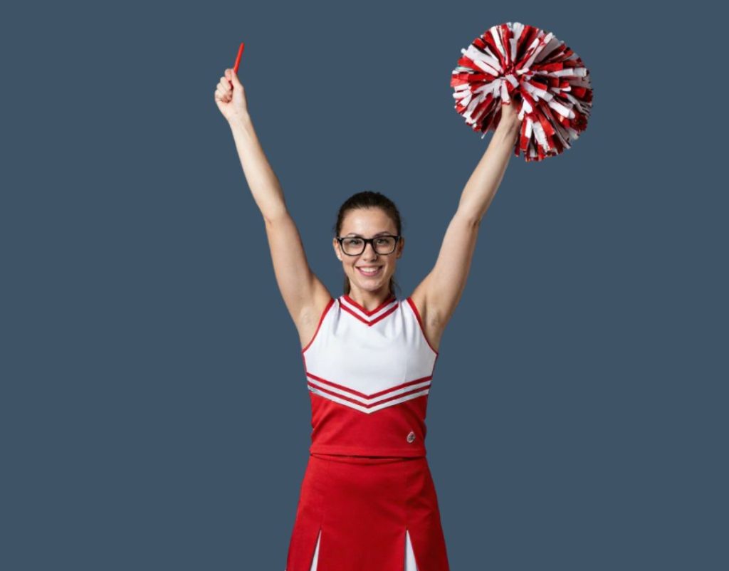 AI generated cheerleader dressed in red and white uniform holding a pompom in one hand and a red pen in the other showing what does an editor do